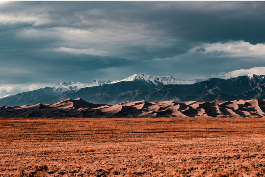 Great Sand Dunes National Park with the dramatic backdrop of Colorado's Rocky Mountains