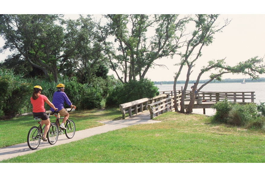 Couple biking at CB State Park
