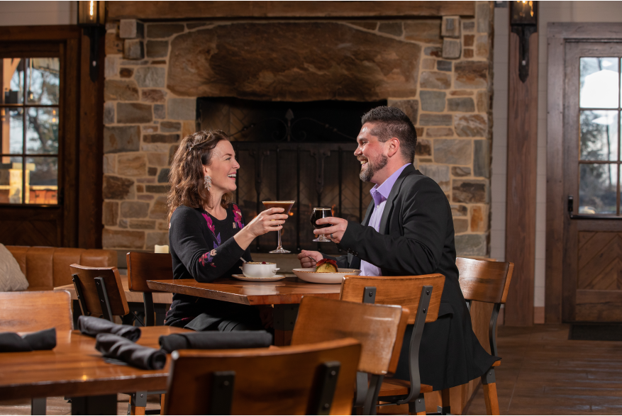 happy couple dining at south county brewing