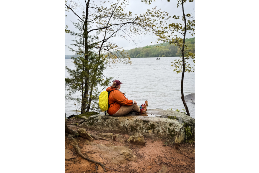 a hiker at Gifford Pinchot State Park enjoying the view of the lake