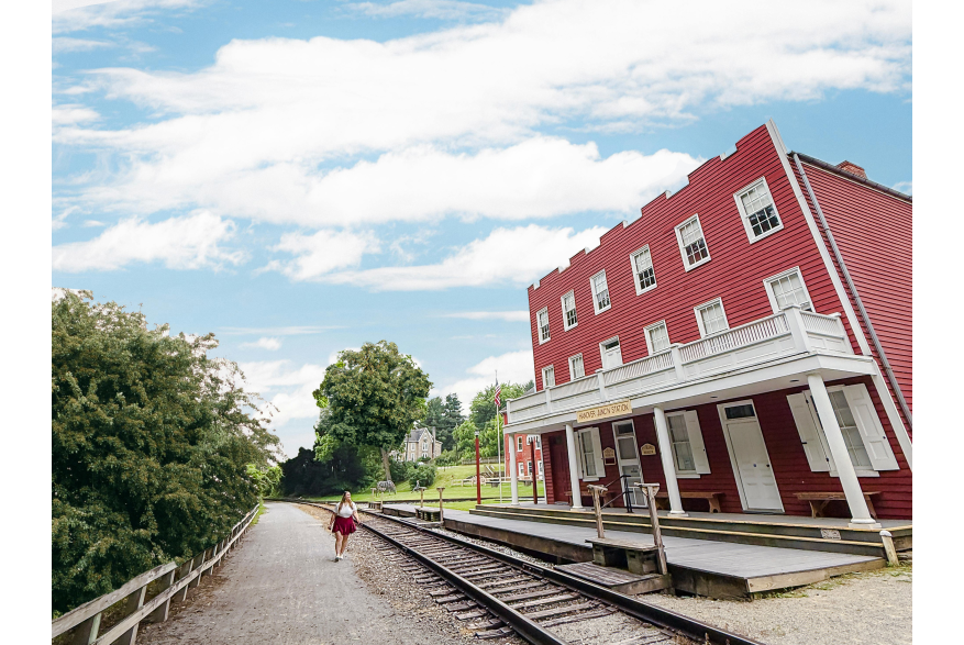 a walker enjoying the views at Hanover Junction along the Heritage Rail Trail
