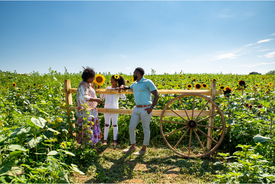 people enjoying the Maple Lawn Sunflower Festival