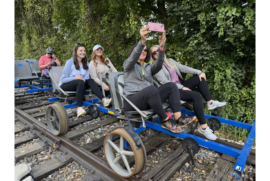 people enjoying the American Rail Bikes along the Heritage Rail Trail