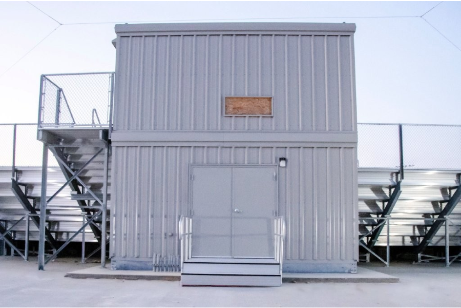 Stacked pressbox over a storage room