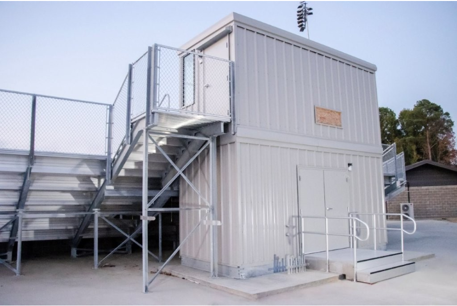 Stacked pressbox over a storage room