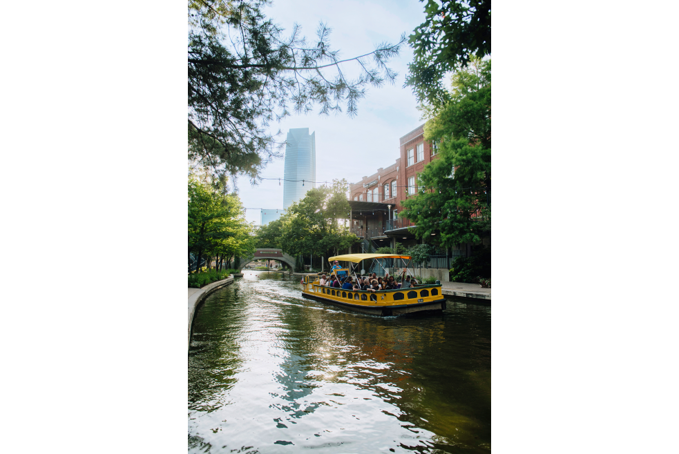 People on the Bricktown Water Taxi on the water in Oklahoma City