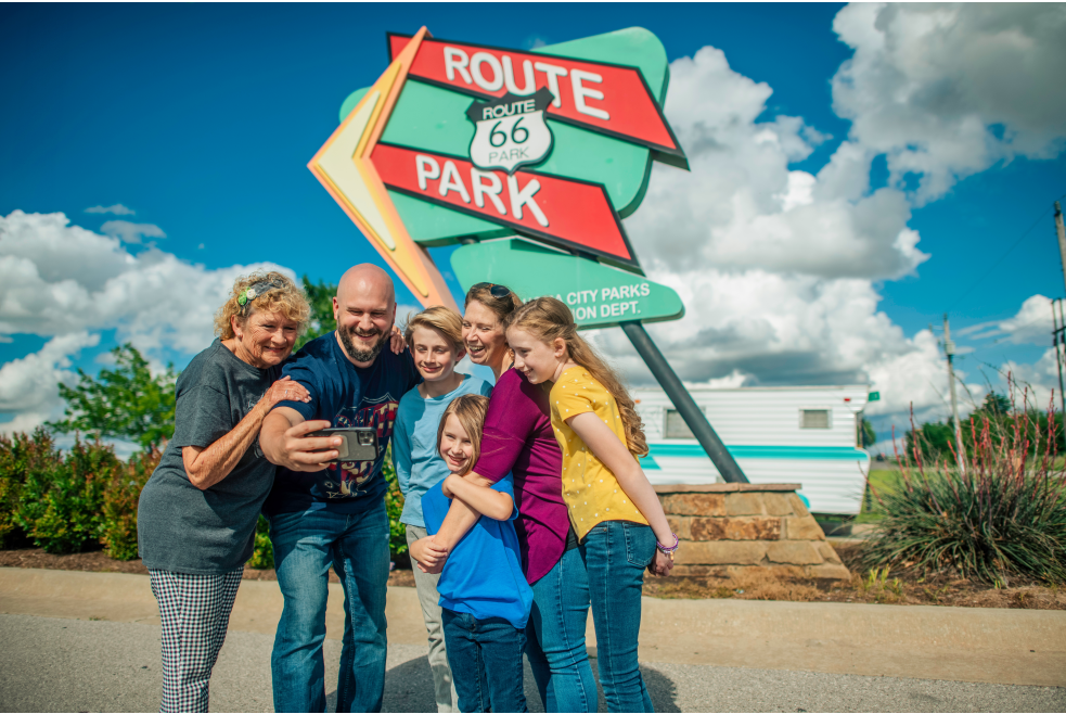 Family standing in Route 66 Park in Oklahoma City taking a photo together