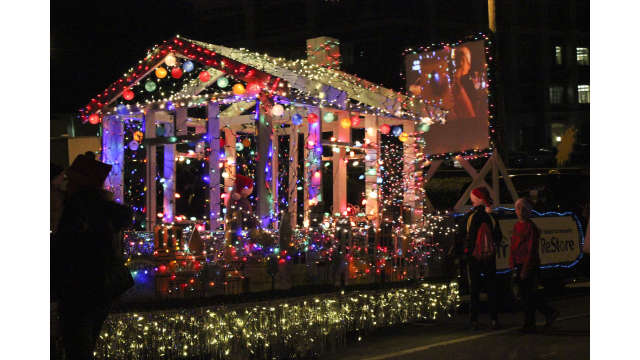 Parade float lit up with Christmas Lights