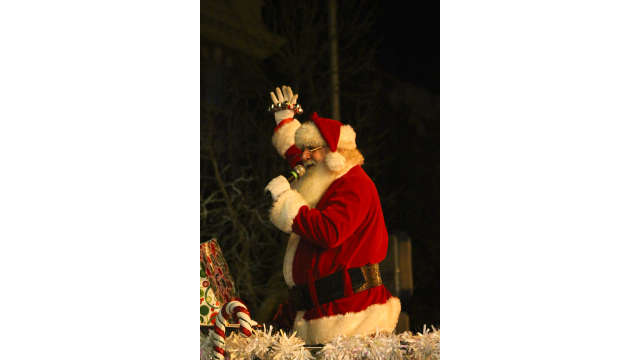 Santa waiving during the Athens Parade of Lights
