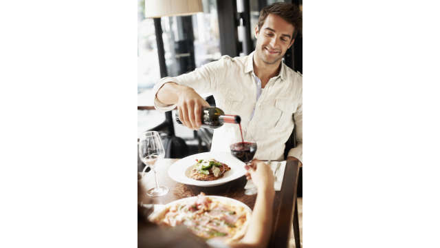 Dining - man pouring wine