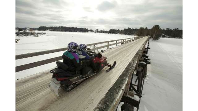 Snowmobile on bridge