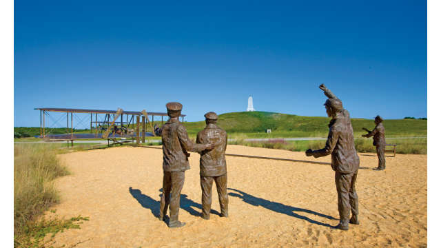 Bronze statue of the Wright Brothers Memorial First Flight in Kill Devil Hills in the OBX