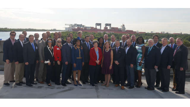Group photo of elected officials and community leaders at Cruise Terminal 29