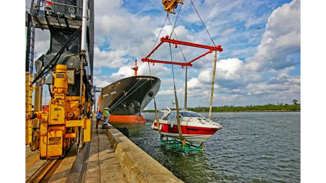 Yacht lifted off ship