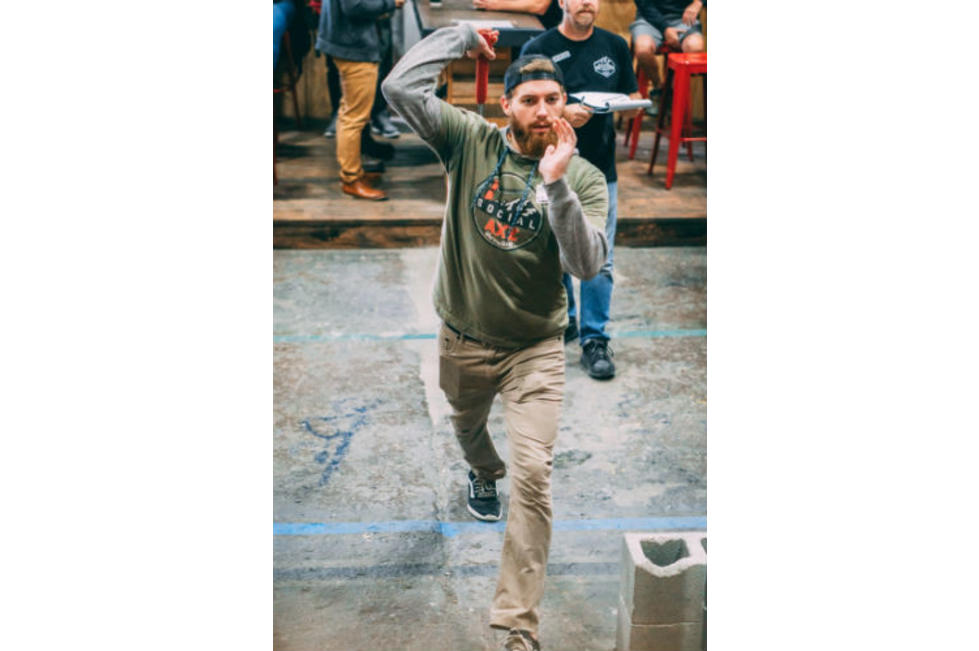 Man Throwing Ax