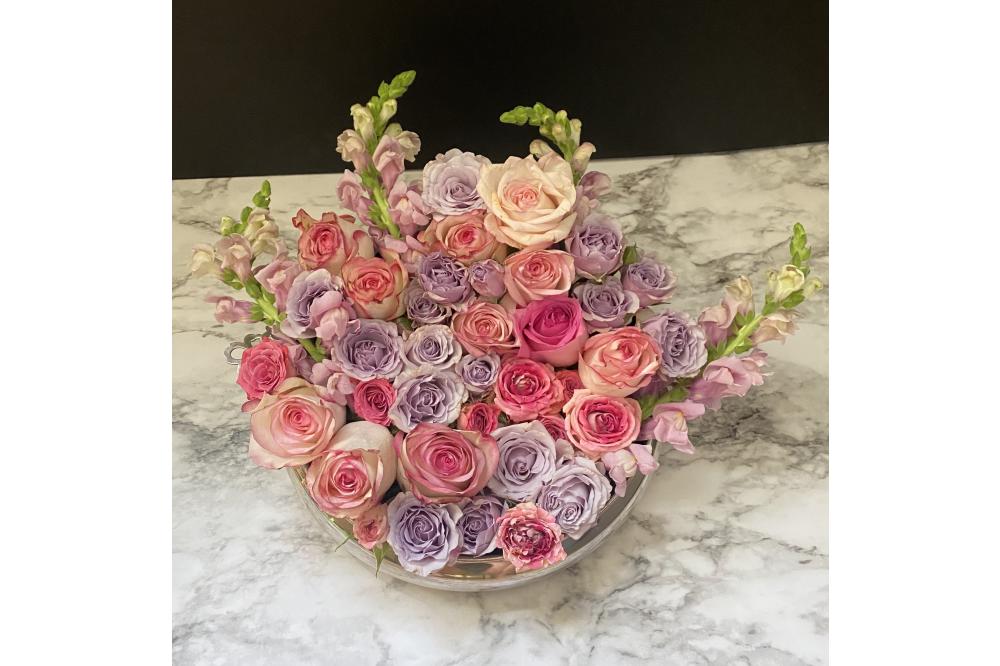 roses in silver centerpiece