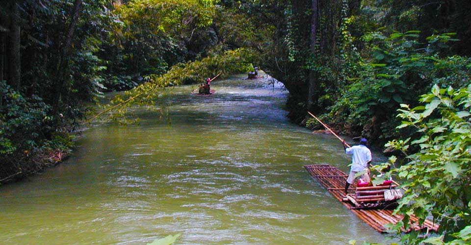 Rafting on the Martha Brae River in - Talented Jamaicans