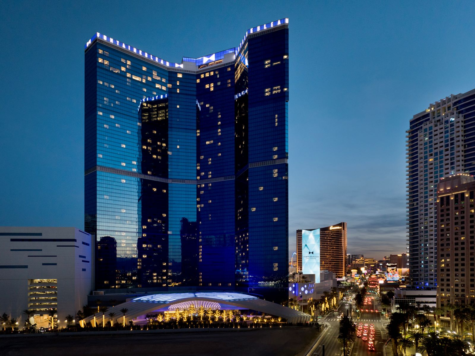 Fontainebleau Las Vegas exterior tower at night on the Las Vegas Strip, illuminated blue luxury resort