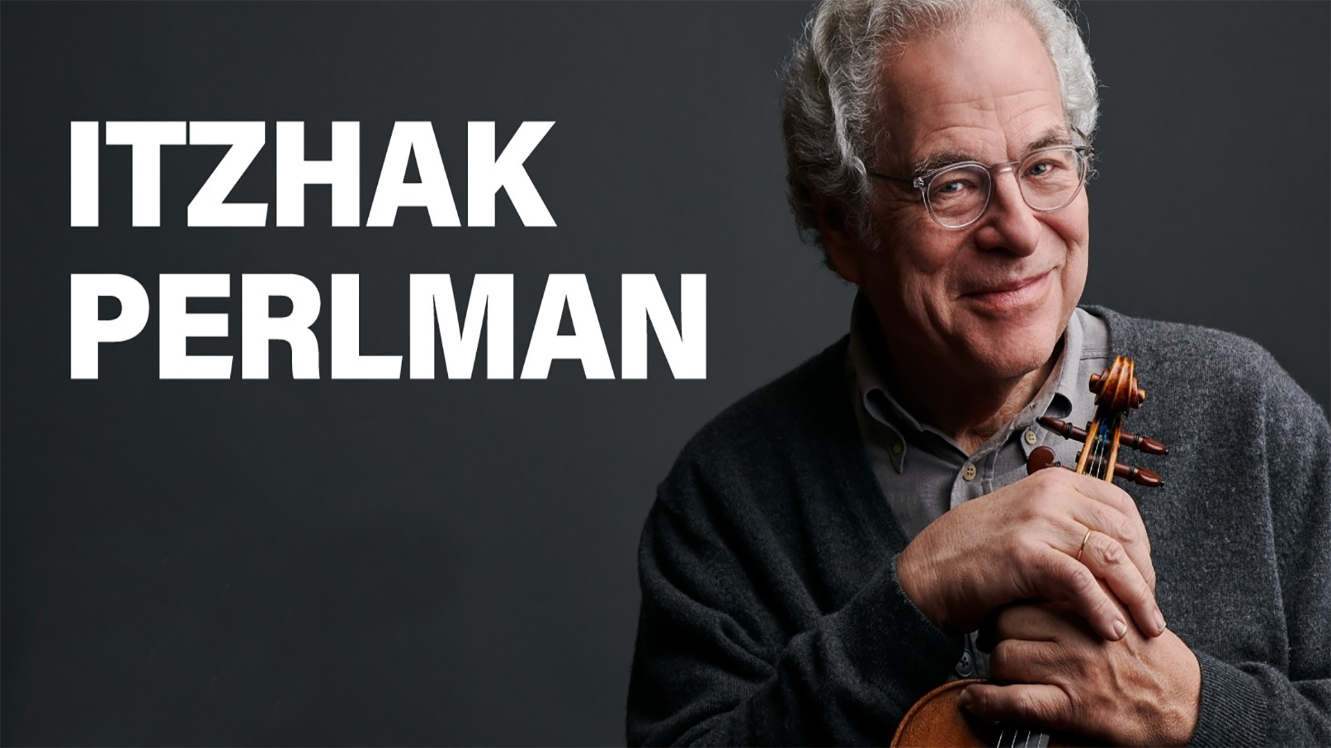 Itzhak Perlman performing at a concert in 2025