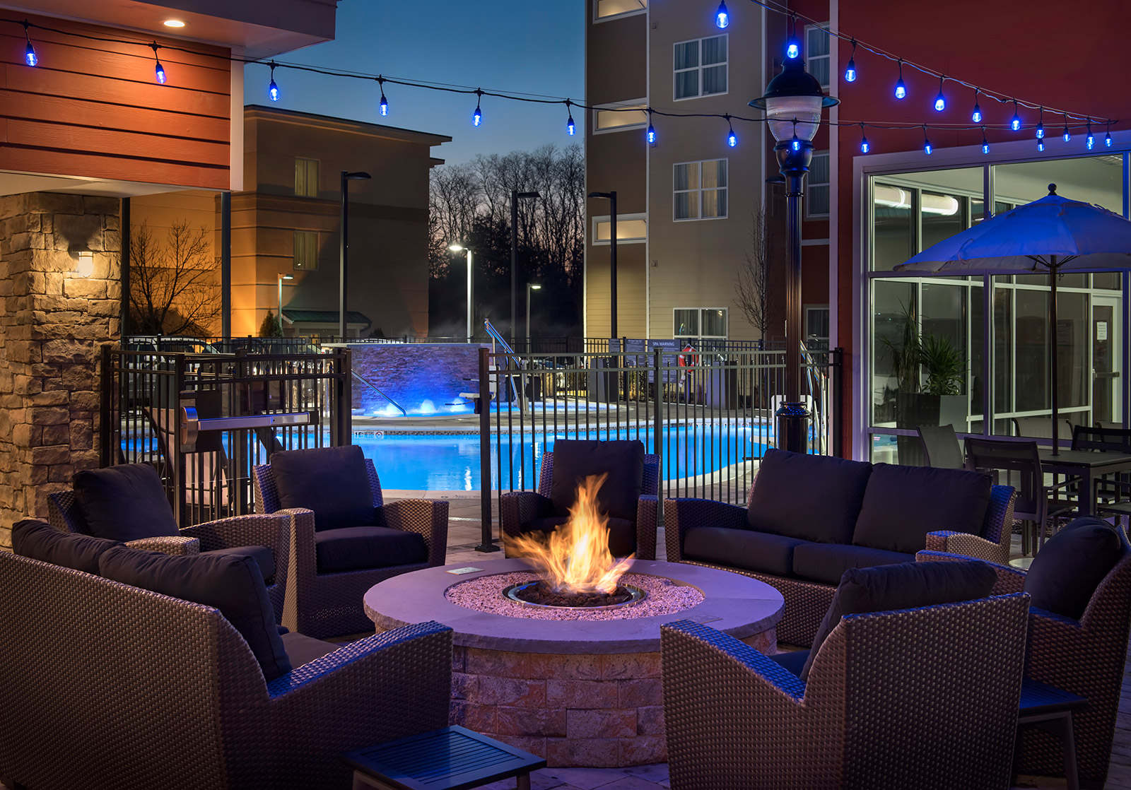 Outdoor Courtyard Area - Relax and enjoy our spacious outdoor patio and warm up next to our fire pit.