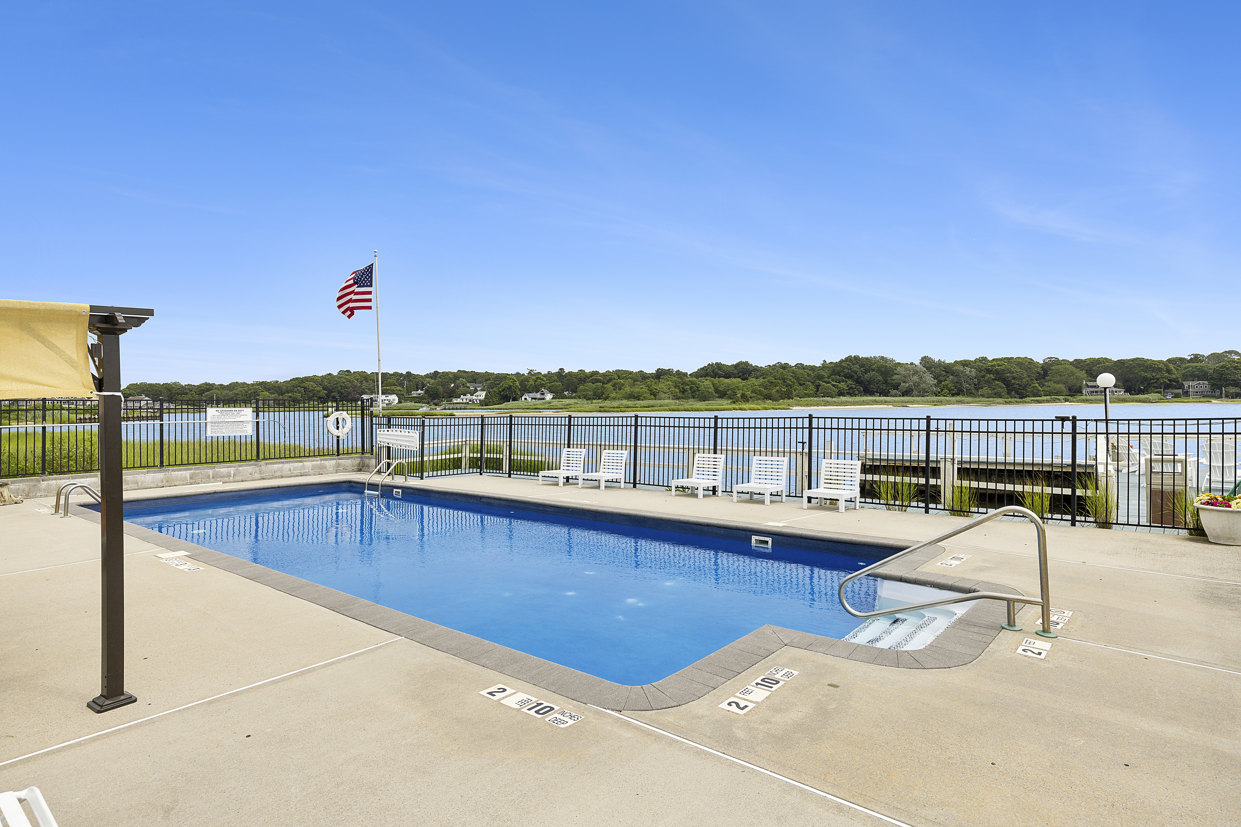 Waterfront Amenities - Pool - Beat the summer heat by taking a dip in our pool, which is open daily from 9 AM to 8 PM. Fitted with two cabanas and an assortment of lounge chairs, the ultimate relaxation starts from the moment you enter the area!