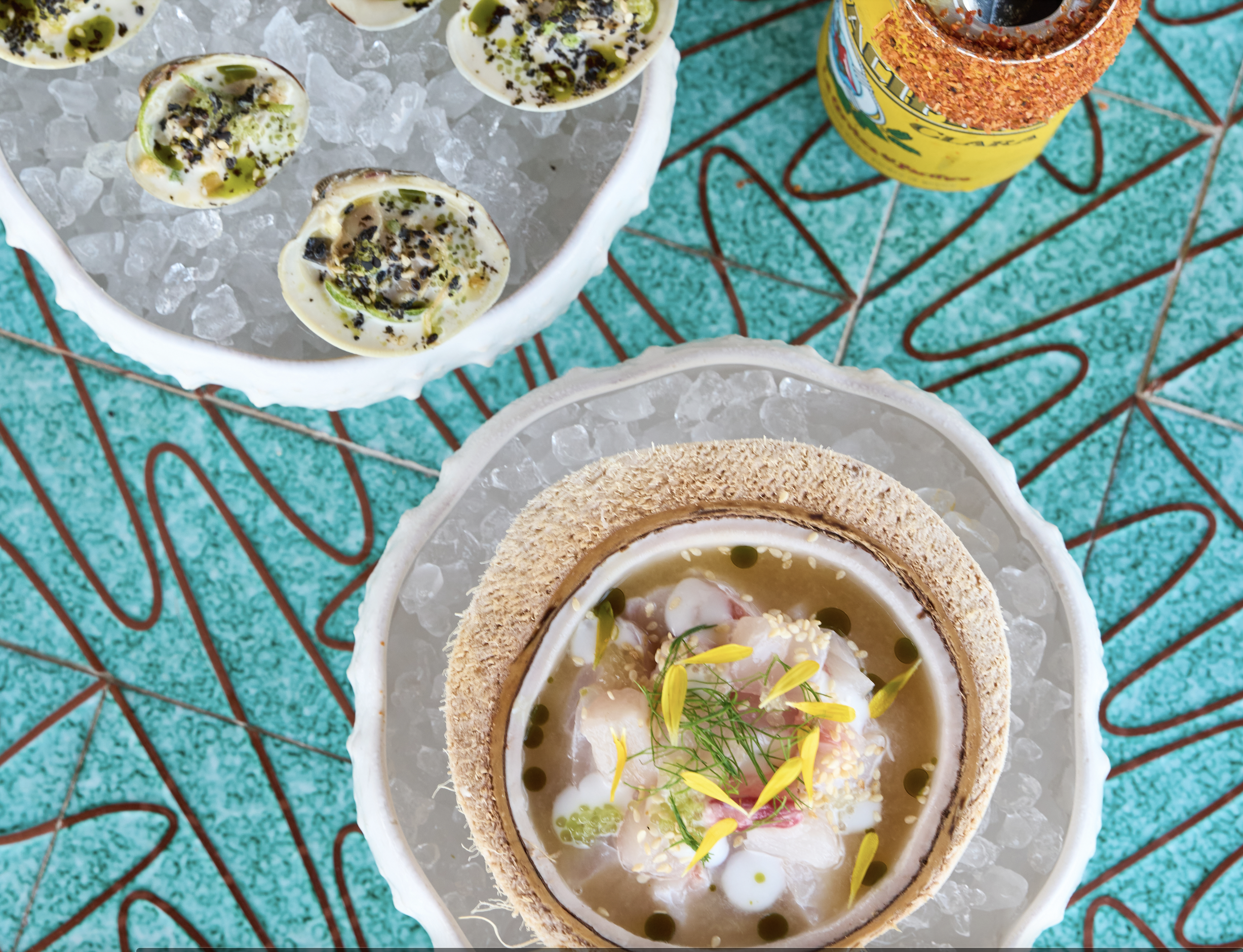 Clams and Coconut Ceviche at Eddie's in Greenport - Local clams at Eddieu2019s waterfront restaurant in Greenport on the North Fork of Long Island at Silver Sands Motel, showcasing fresh coastal seafood dining with harbor views.