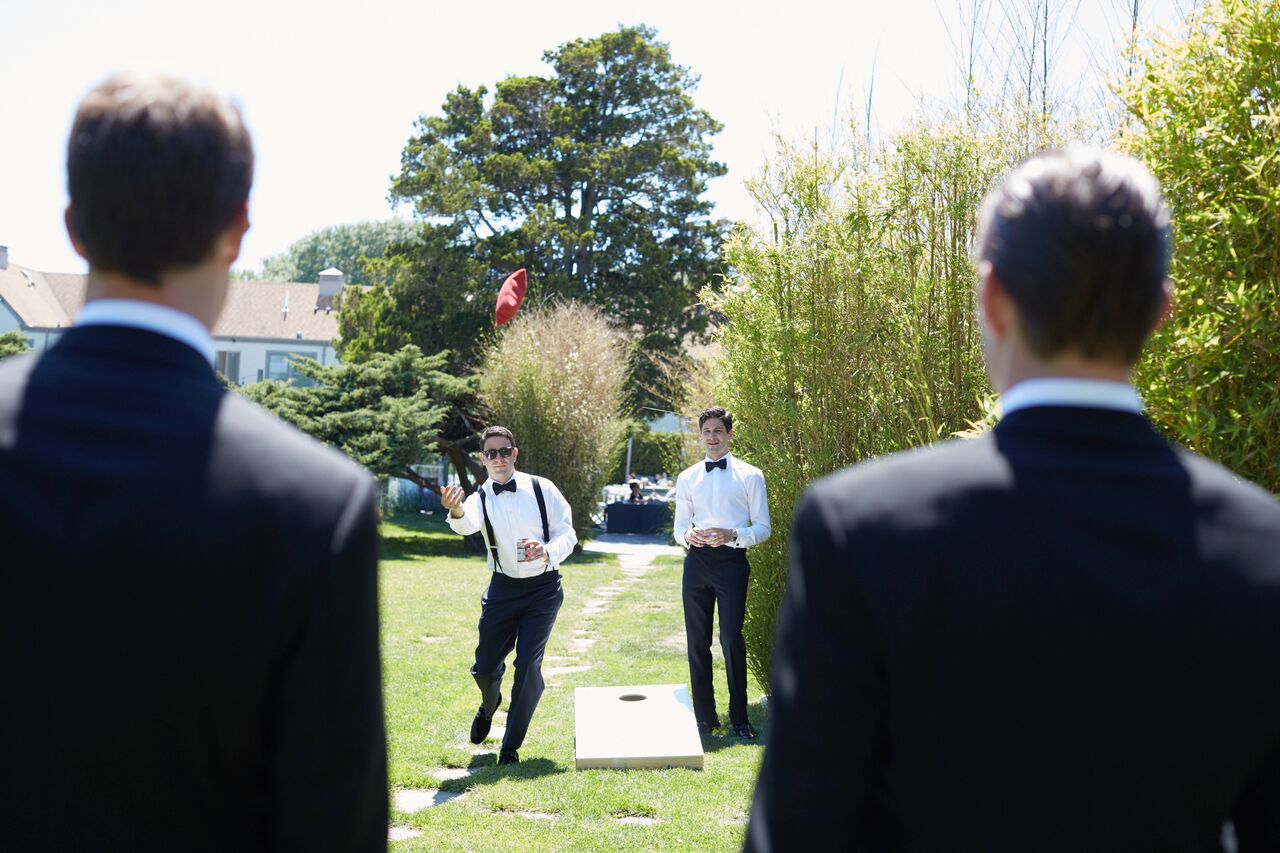 Sole East Resort- Wedding - Pre-ceremony wedding party lawn games. Contact events@soleeast.com today to book your wedding or special event!