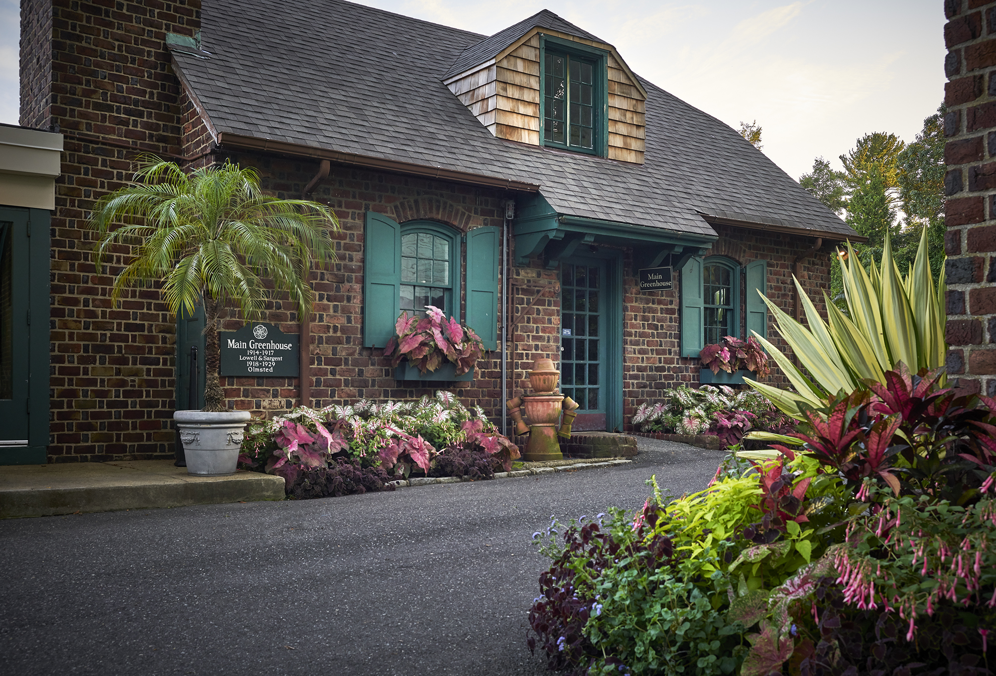 Main Greenhouse - The Main Greenhouse features tropical plants, colorful orchids, palm trees, begonias, ferns, cacti and more.