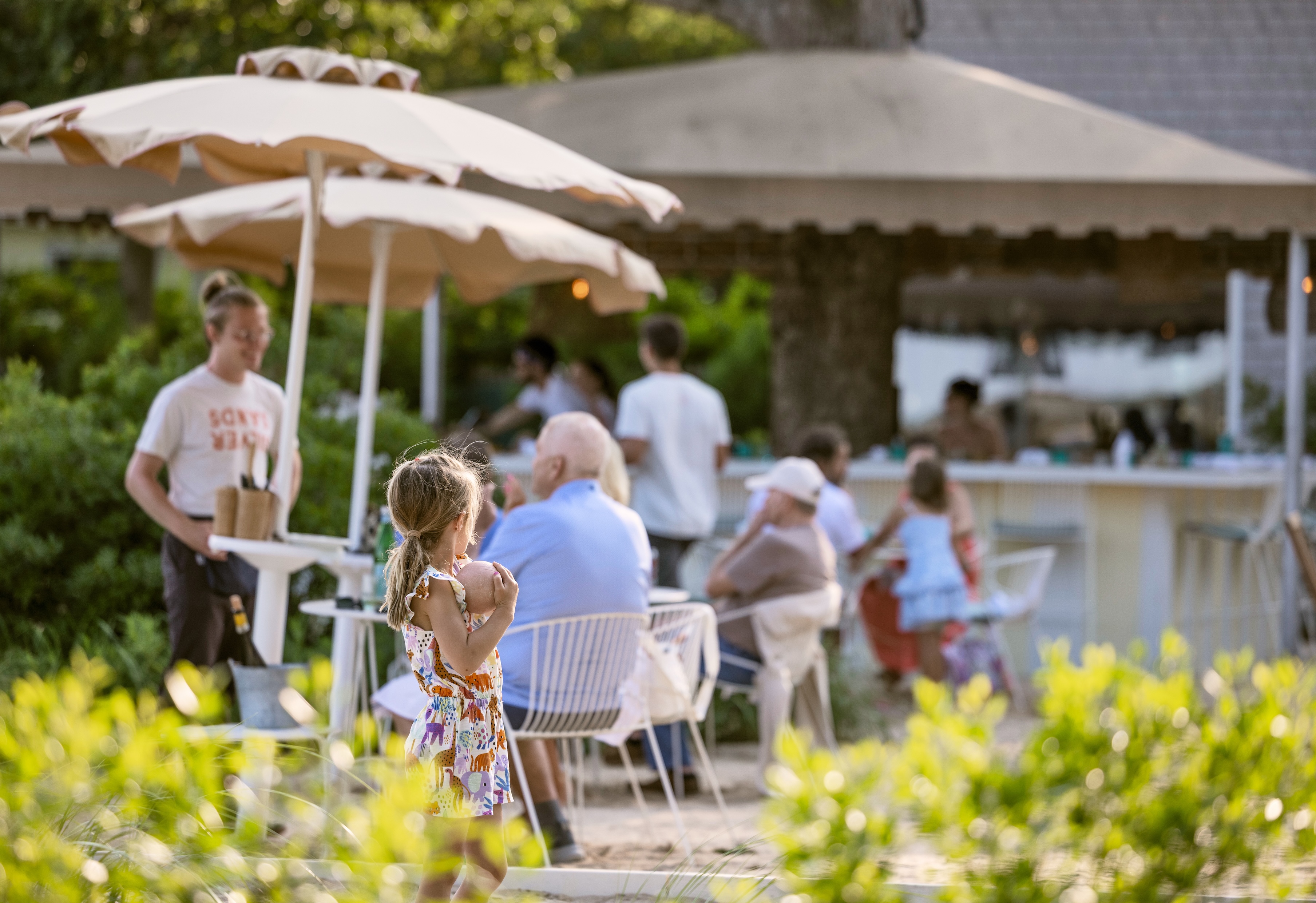 Eddie's Silver Sands - Families gathering for dinner at Eddieu2019s waterfront restaurant in Greenport on the North Fork of Long Island at Silver Sands Motel