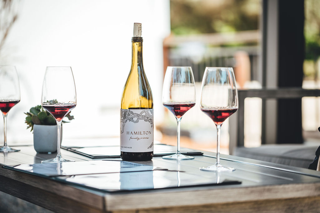 Hamilton wines on a rustic table