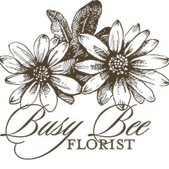 White wreath arranged by a florist in East Greenwich, RI : Busy Bee Florist