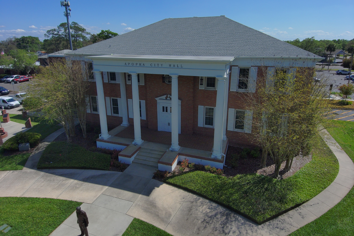 Apopka City Hall red-brick facade with white columns and front steps