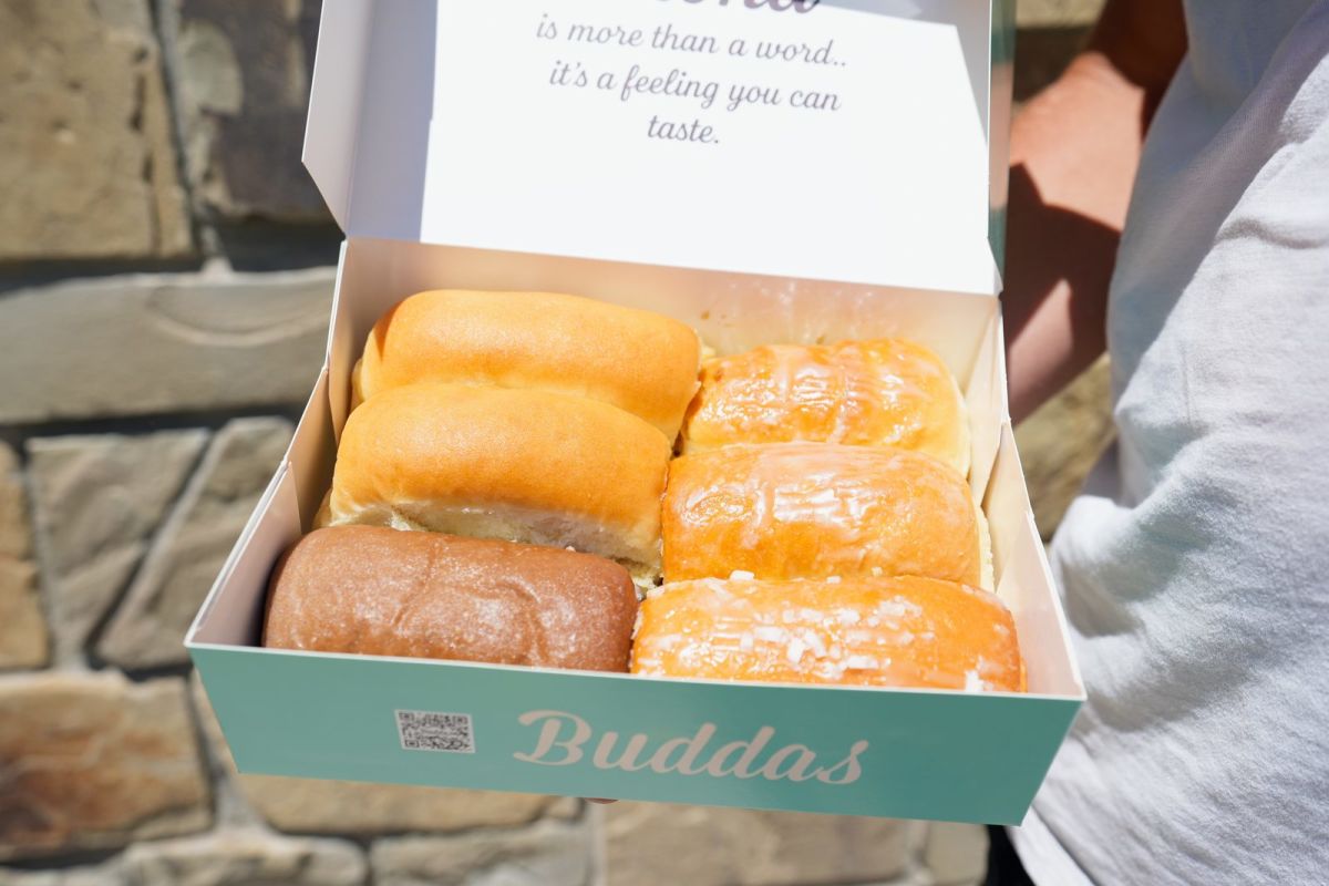 A box of Hawaiian butter rolls in classic, sticky, coconut and taro flavors from Budda’s Bakery in Pleasant Grove