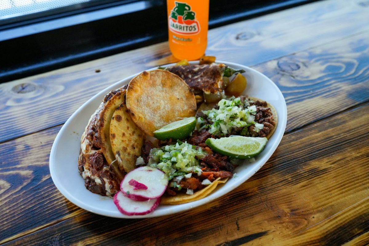 A plate of tacos with radish and lime, including the signature Fabuloso Taco, at Los Fabulosos Tacos in Orem