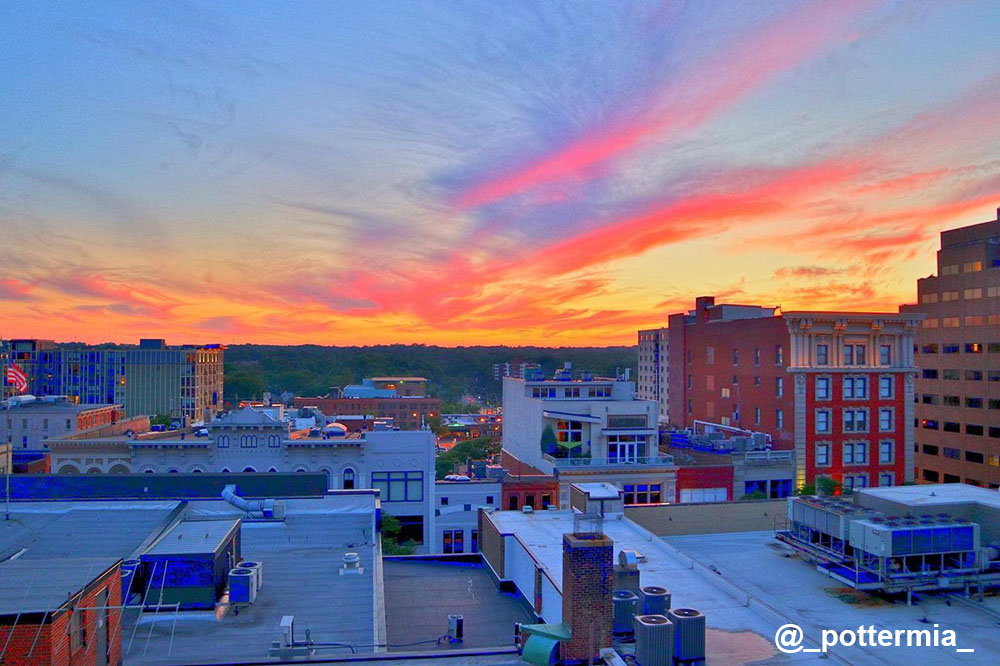 Sun setting over skyline of Downtown Ann Arbor