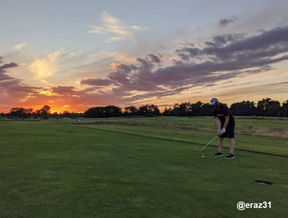 Sunset over golfer at Lake Forest Golf Club