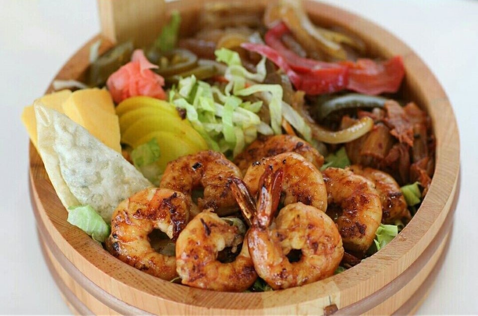 bowl of food with shrimp and vegetables