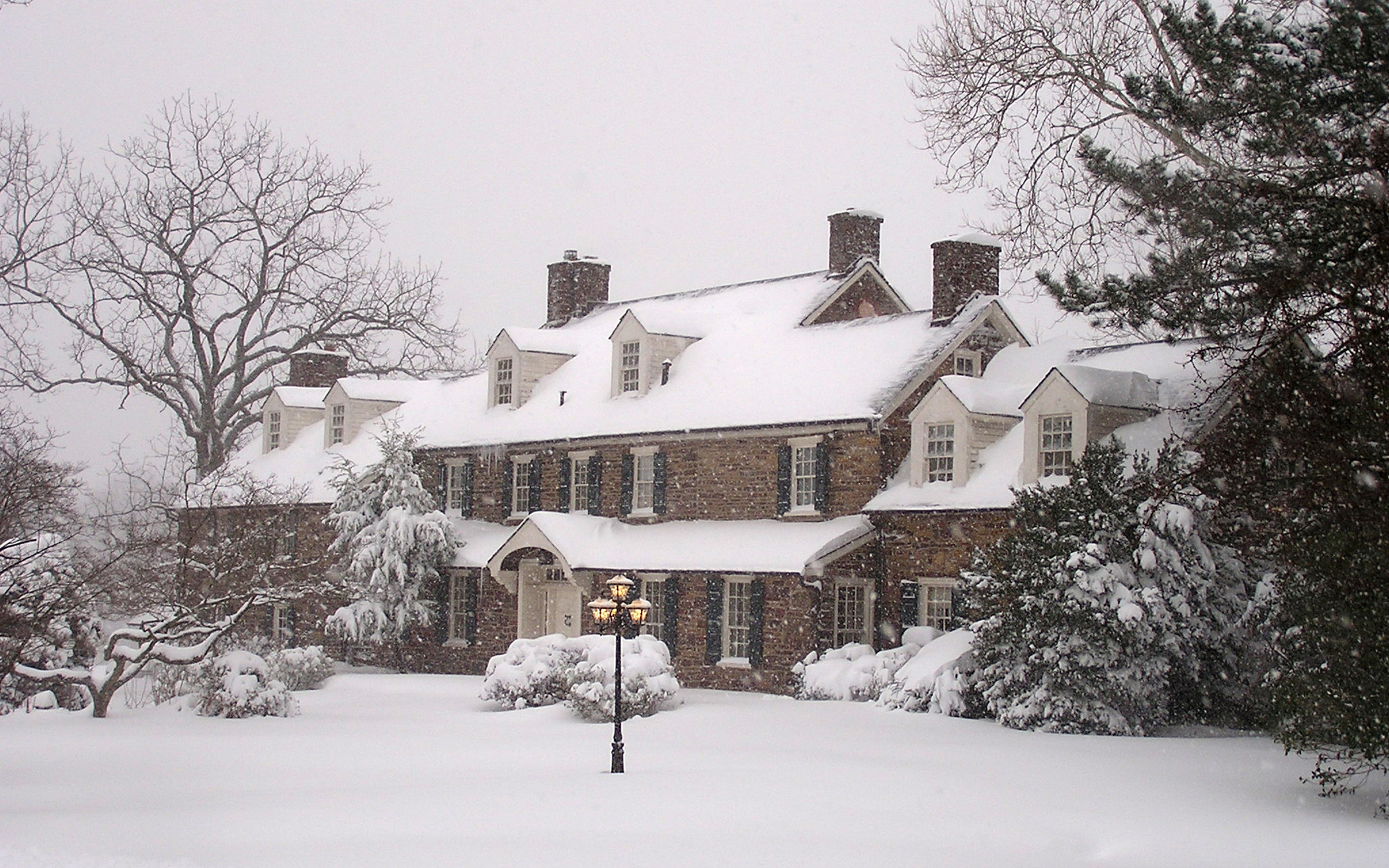 A breathtaking snow-covered Pearl S. Buck House in winter stands as a memorial to Pearl S. Buck, the author of The Good Earth who dedicated her life to helping underpriviledged children.