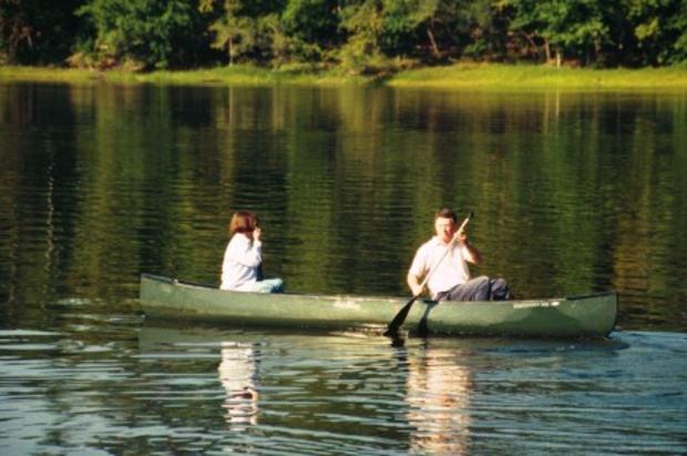 couple in canoe on University Lake Chapel Hill