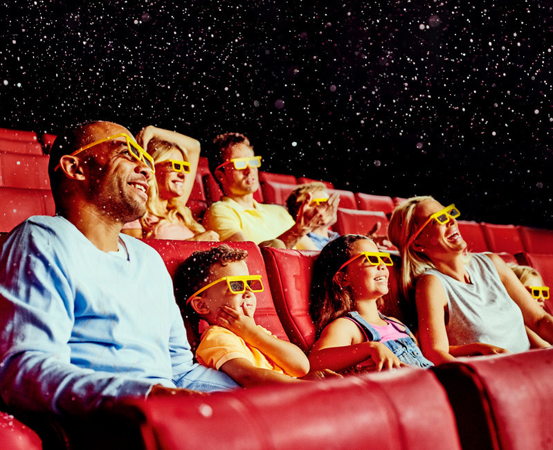 Family watching LEGO character movie in 4D Cinema
