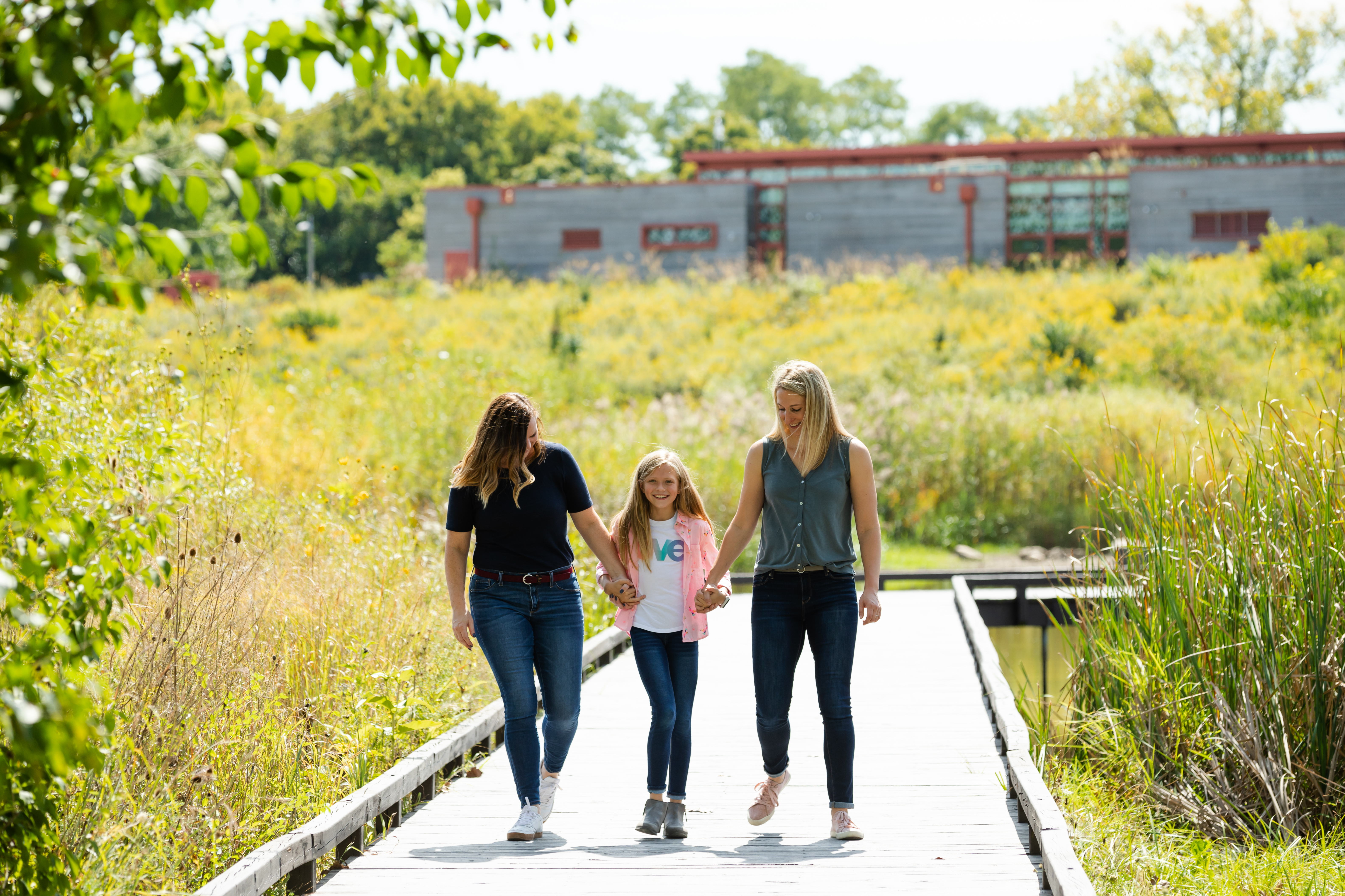 Family walking through the Scioto Audubon Metro Park