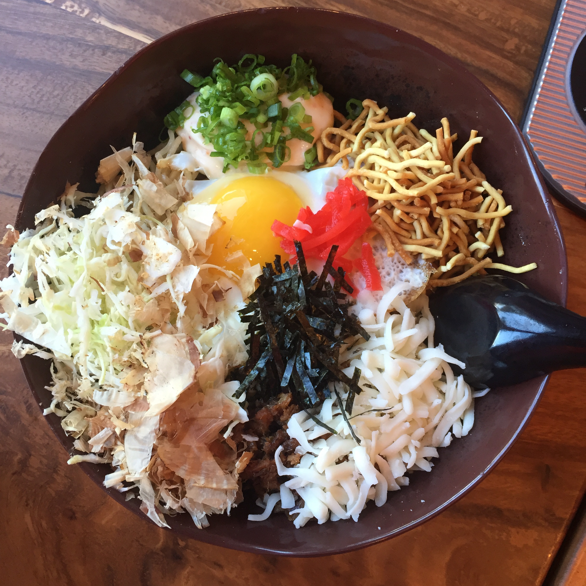 Colorful bowl of ramen with various ingredients from Fukuryu Ramen