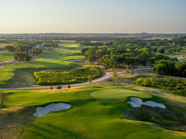 An aerial view of the PGA Frisco golf course and landscape in Frisco, Texas.