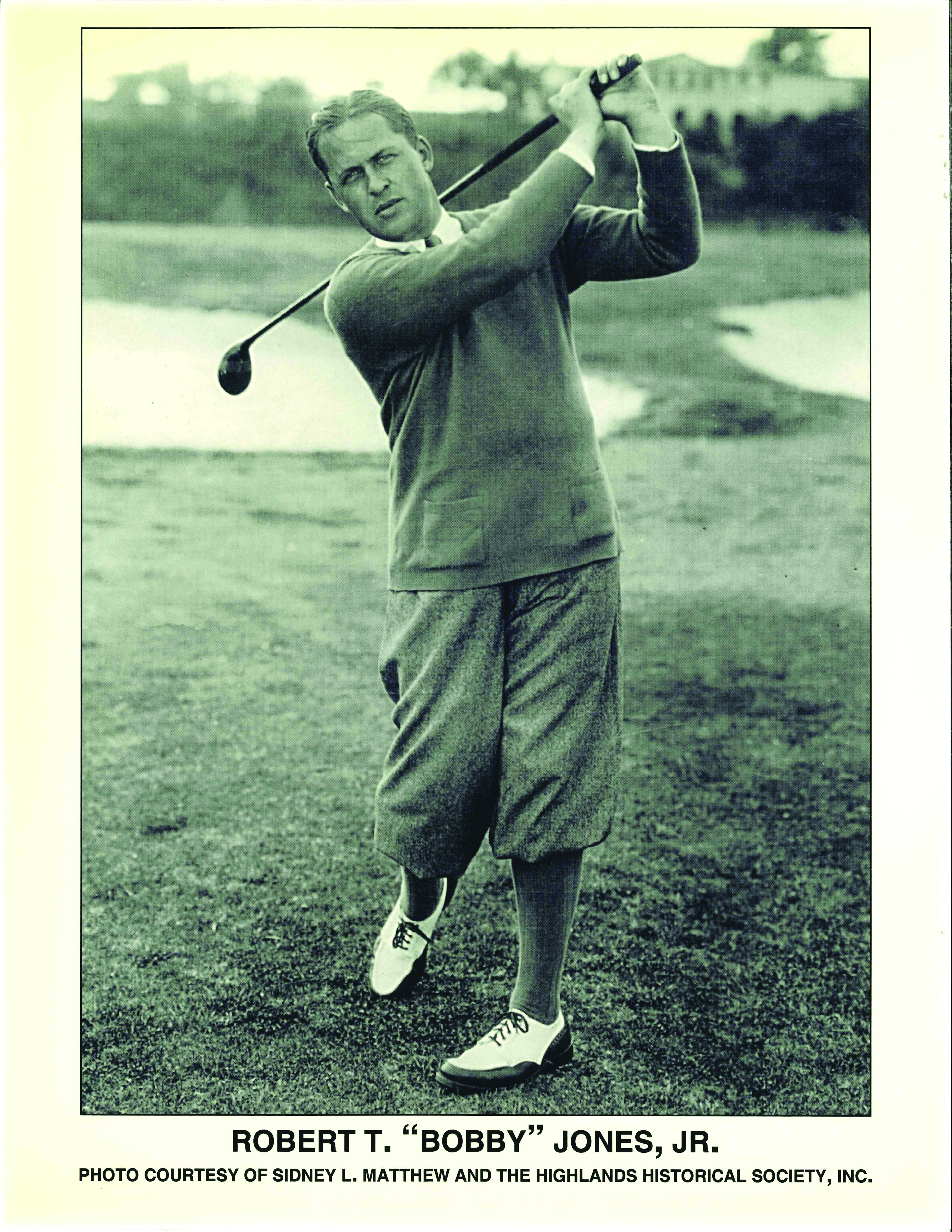 Golfer Bobby Jones mid-swing in a vintage portrait