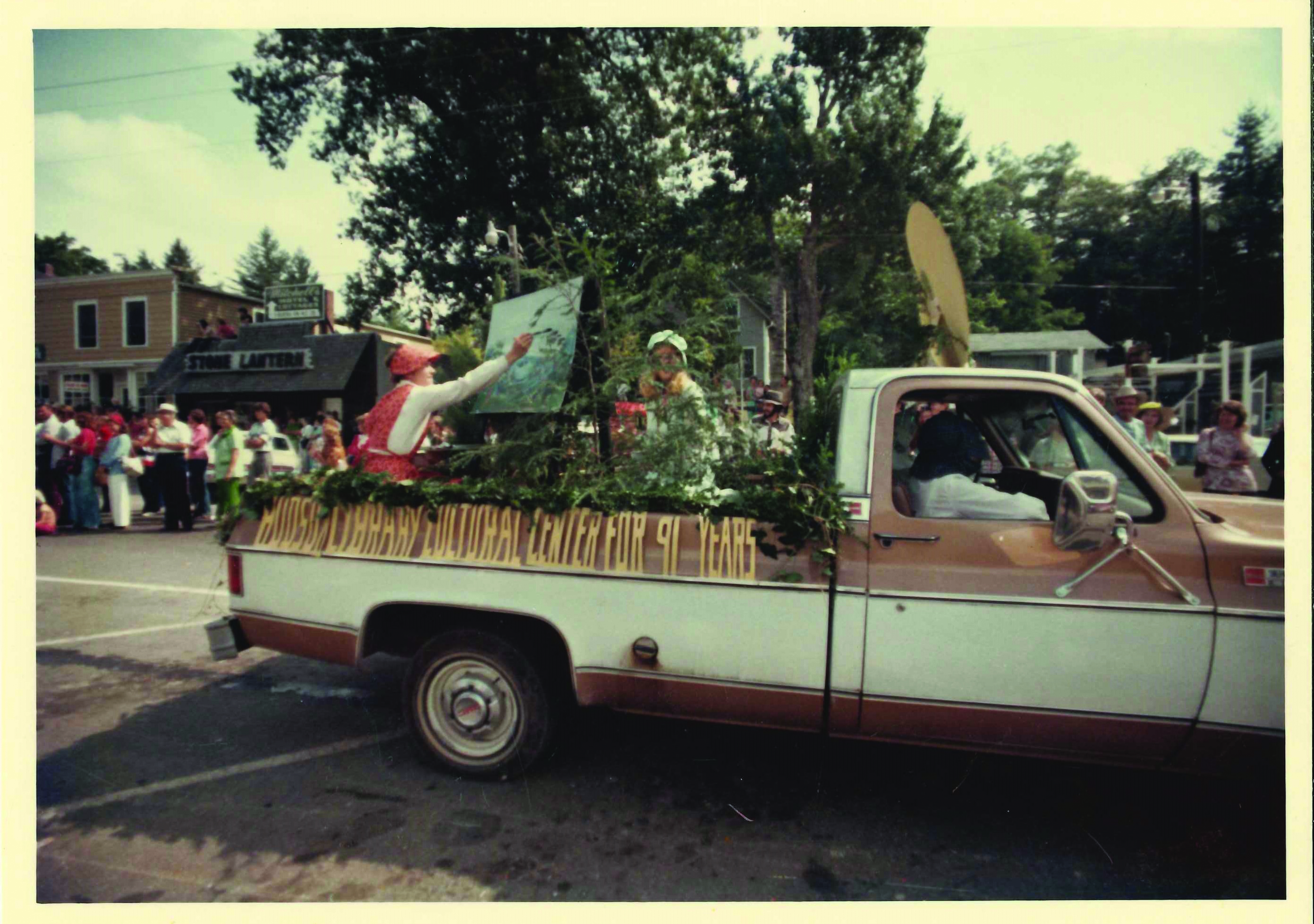 Vintage photo of a parade float on a pickup truck in downtown Highlands