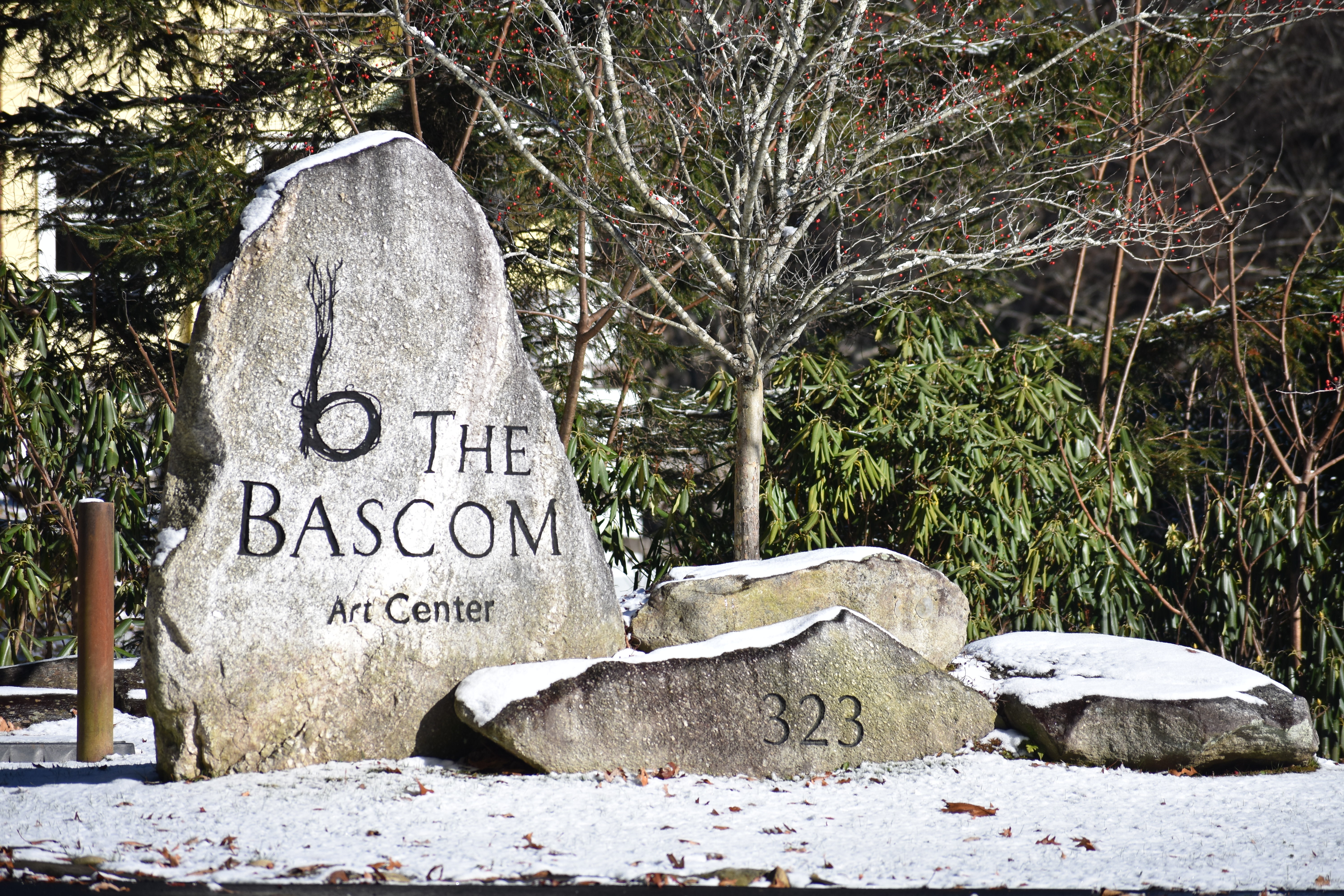 The Bascom Art Center stone sign with a light dusting of snow