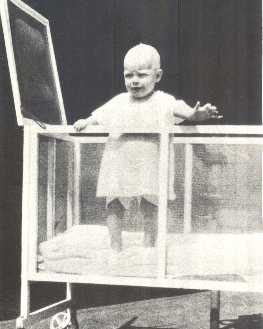 Ava Gardner age 1 in crib known as a Kiddie Coup.