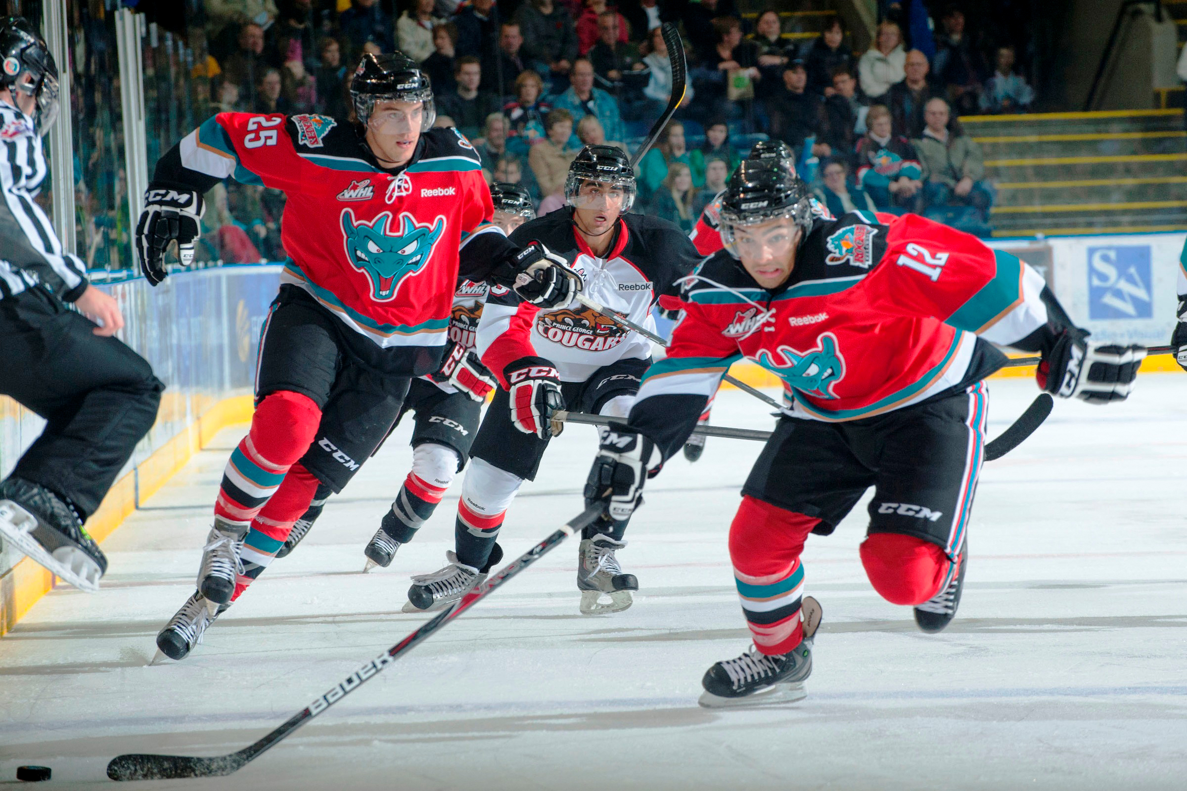 Kelowna Rockets player Tyrell Goulbourne (front) and Colton Heffley (left) head up ice with the Rockets during the 2012-13 Western Hockey League campaign.