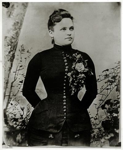 a black and white historical headshot of Belle Brezing