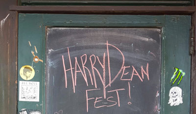 The door at the Green Lantern bar announcing Harry Dean Stanton fest written in chalk.